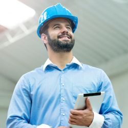 picture of a smiling engineer who received excellent marketing services from the engineering marketing agency